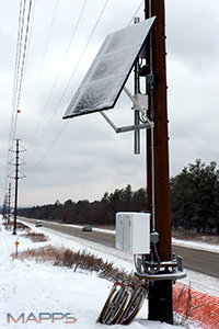 group 8D solar battery boxes on utility power pole